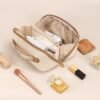 715ywBNJyDL._AC_SL1500_.jpg Prite Makeup Bag for Women Travel Waterproof Vegan Leather Cosmetic Bag Open Flat Toiletry Bag With Clear Divider and Handle (Beige)