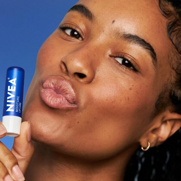 817jHTfMQzL._SL1500_.jpg NIVEA Moisture Lip Care, Hydrating Lip Balm with Shea Butter, Nourishing Oils and Vitamin C & E, 3-in-1 Moisture, Repair and Nourish, 0.17 Oz Stick, Pack of 4