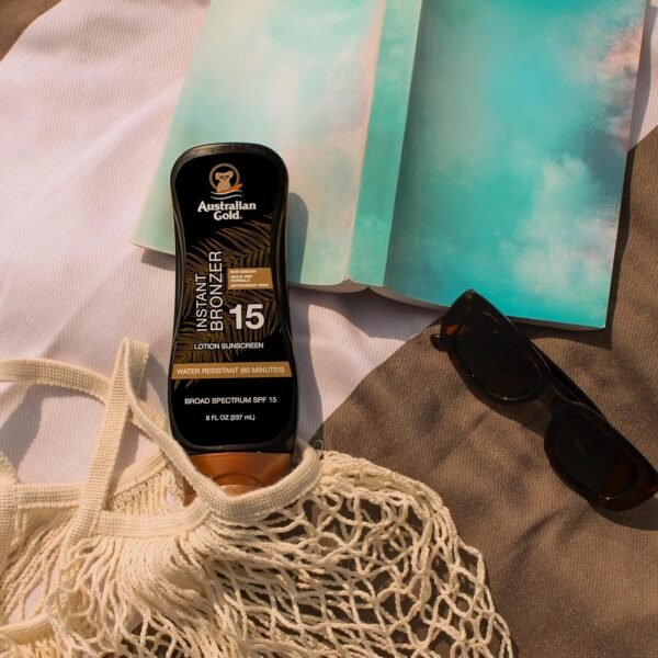 91XjOWi-UL._SL1500_.jpg Australian Gold Sunscreen Lotion with Instant Bronzer SPF 15, 8 Ounce | Broad Spectrum | Water Resistant | Non-Greasy | SPF 15 8 Fl Oz (Pack of 1)
