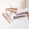 61SDnhAzVlL._SL1500_.jpg Sndyi 6pcs Neutral Sectioning and Styling Clips - Non-Slip Duck Billed With Silicone Band for Salon, Hairdresser, Barber Use
