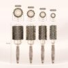 71hdGKFV46L._SL1500_.jpg Round Barrel Anti-Static Hair Brush with Boar Bristles, Nano Thermal Ceramic Ionic Tech | For Extra Shine | Protect Hair, Enhance Texture, For Straightening & Drying (1 1/4 inch)