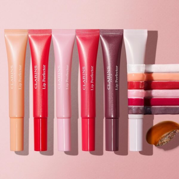 81BubEXtKL._SL1500_.jpg Clarins Lip Perfector | 2-In-1 Lip and Cheek Color Balm | Nourishing, Hydrating and Plumps Lips |Adds Buildable Color to Cheeks for Natural Glow |Contains Natural Plant Extracts With Skincare Benefits