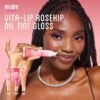 81G-8szZGVL._SL1500_.jpg Ruby Kisses Broadway Vita-Lip Tinted Lip Gloss (3 Pack Baby Pink, Bubble Gum, Nude Pink) Ultra-Hydrating Rosehip + Jojoba Oil & Soothing Formula with Vitamins, High-Shine Non-Sticky Finish Lip Balm